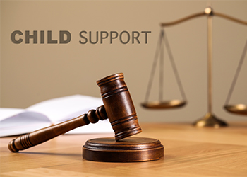 Child Support word with gavel and scale of justice